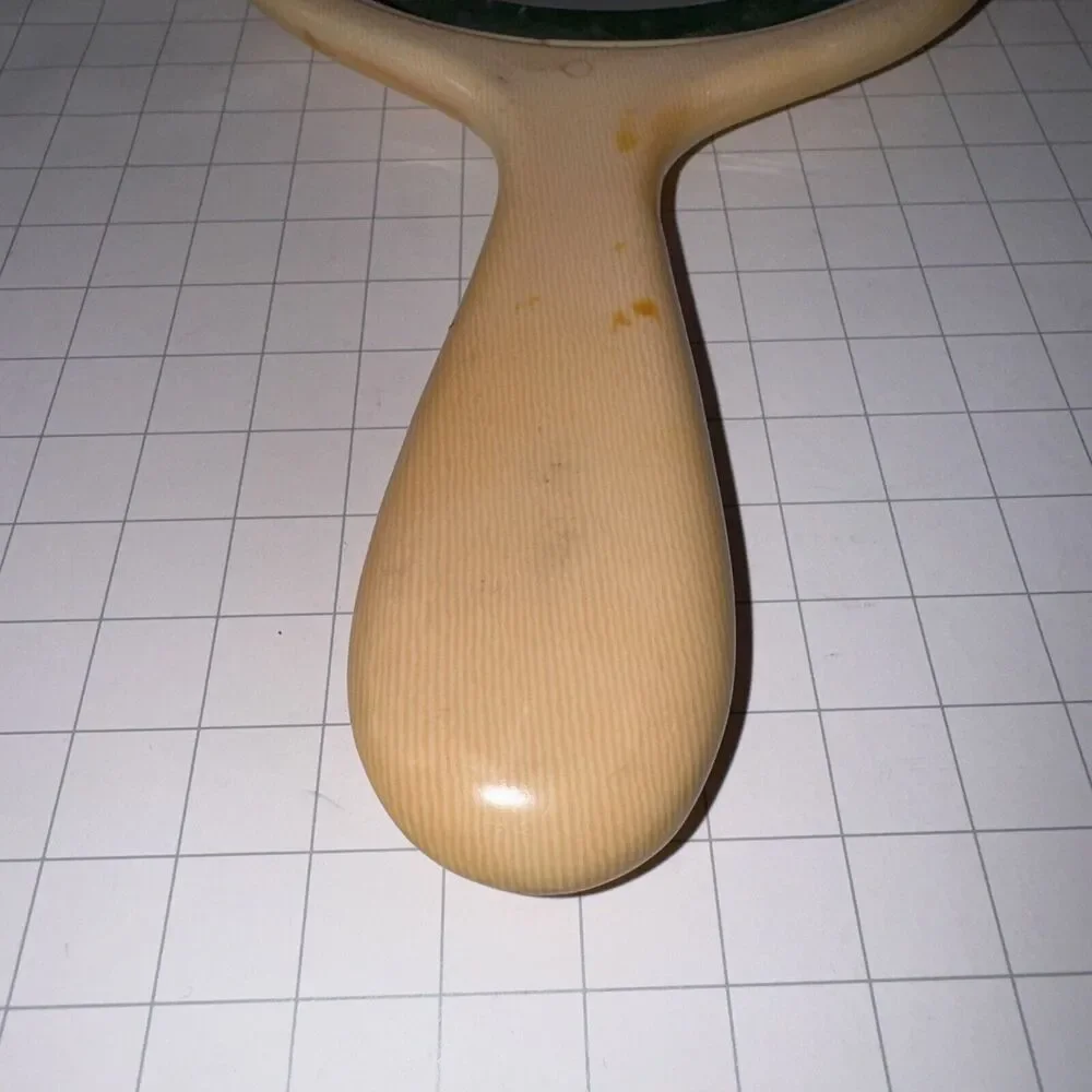 Vintage Art Deco Beveled Oval Celluloid Hand Mirror 9.5” approx Ivory Yellow